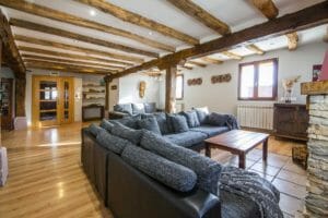 Zona sofas del salón de la Casa Rural Zona sofas del salón de la Casa Rural